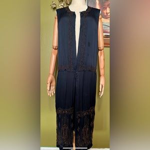 Original 1920’s black silk and bronze beaded flapper dress.